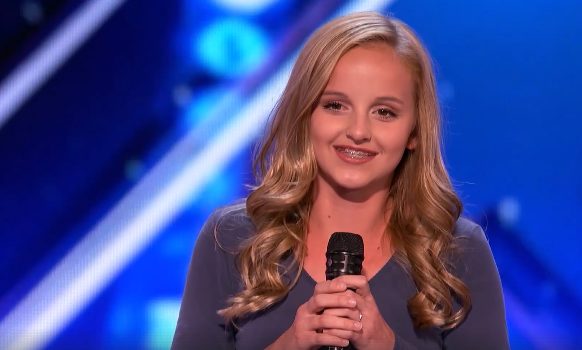 When Evie started talking with the judges, she was cheerful and all smiles.