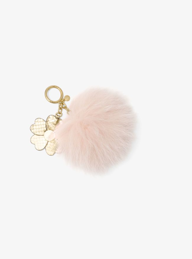 Michael Kors has a penchant for selling keychains made of real fur, and once you add in the leather flower charm, you'll spend $78 to keep your keys designer.