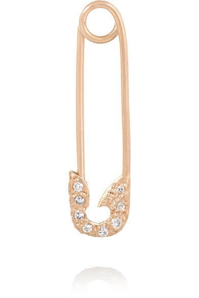 In the U.K., wearing a safety pin is a sign of support for refugees and immigrants. This $995 version is gaudy at best and exploitative at worst.