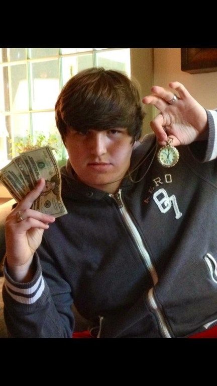 This kid's a straight-up baller. Just look a that pocket watch and Aeropostale jacket. 