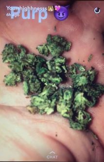 ...and proudly showing off her stash.