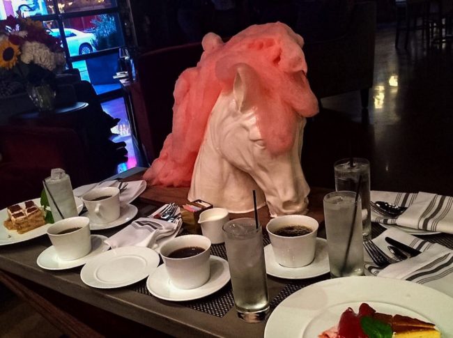 "That moment when everyone else gets plates and your dessert arrives on a porcelain horse head."