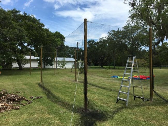 Next came hanging the netting, which was much harder than expected. Getting it to lay correctly at the top was particularly difficult. 