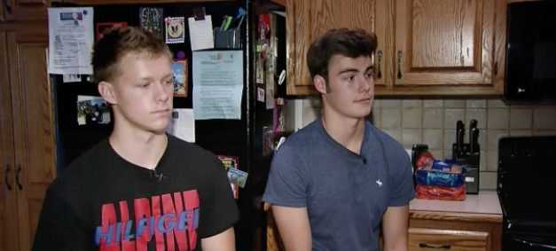 "The mom's hand was on the baby seat," said Barry, pictured on the left. "So I kind of had to move her hand and pull the baby closer." He crawled through the broken window, protecting the child's head.