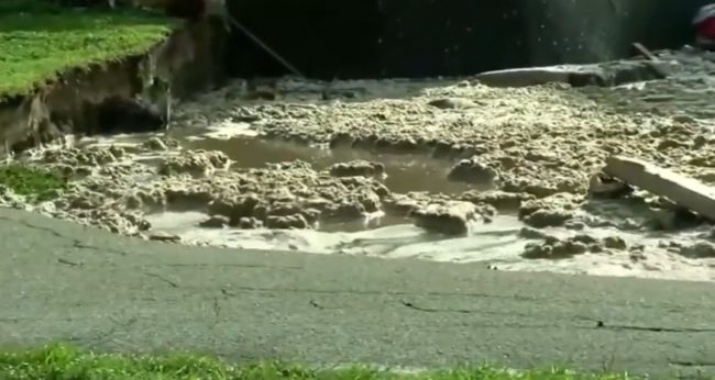 In the span of a day, the sinkhole reached over 200 feet across and 50 feet deep. 