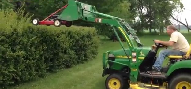...he found the perfect way to keep his hedges nice and straight.