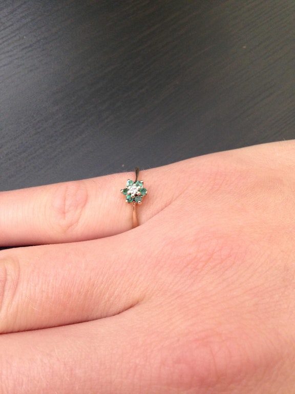 "Jackpot. 10k gold, diamond, and emerald ring for $1."