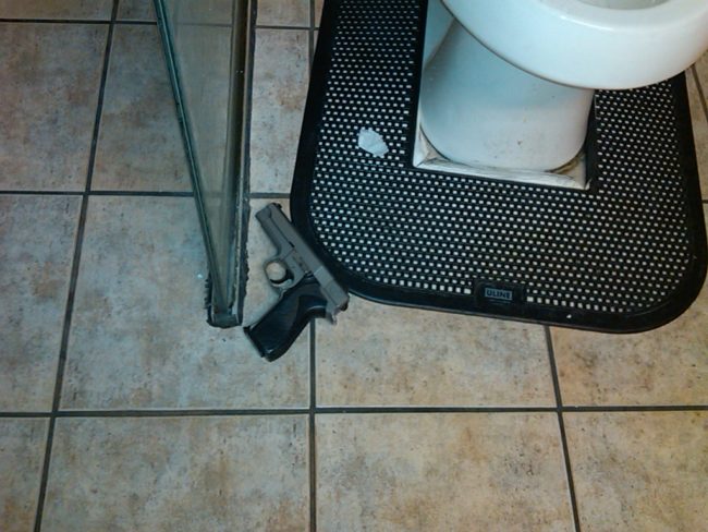 It's not every day you stumble across a loaded gun on a bathroom floor.