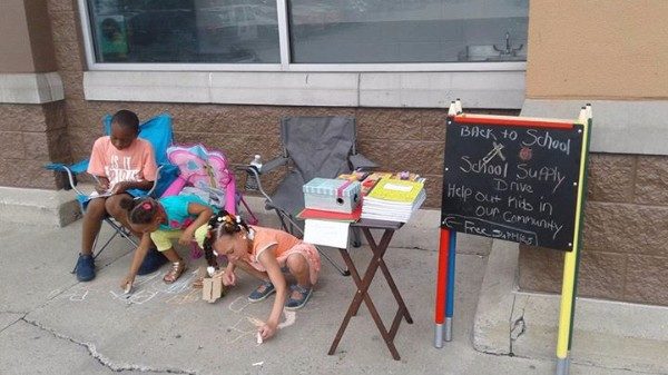 She and her children sit outside of a Walmart store, collect donated supplies, and also hand them out to families who could really use them.