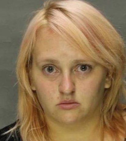 The couple turned themselves in after a warrant was issued for their arrest following an investigation.