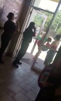 The young man filming the incident is pretty amused, until that rage becomes a crime. The manager, on the phone with police, is confronted by the woman throwing things at him and kicking him, all the while claiming he was hurting her.