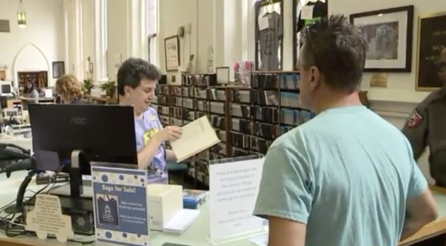 Handing the book back over to the local librarian, Hannon anxiously waited to hear how much he'd owe in fees.