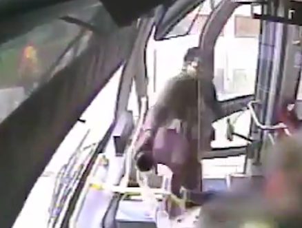 She turned toward the driver and flung what was in her travel mug right in his face. Let's just say it wasn't coffee.