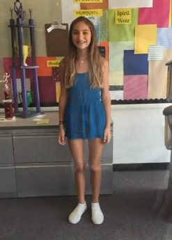 About her first outfit, Demetra was told that it was too distracting to boys. 