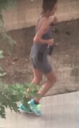Cathy Budde took this photo of a female jogger who her kids told her was pooping on their lawn.