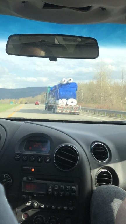 A truck carrying rolls of plastic? More like Cookie Monster!