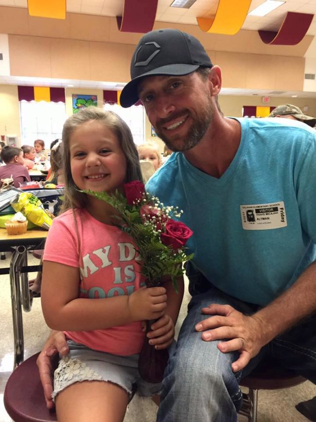 After a warm embrace Altman’s little girl couldn’t help but smile as he presented her with a bouquet of roses and Happy Meal.