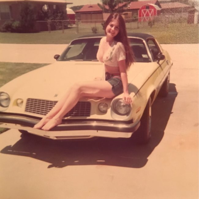 "My mom at 16 years old with her Camaro in 1975."