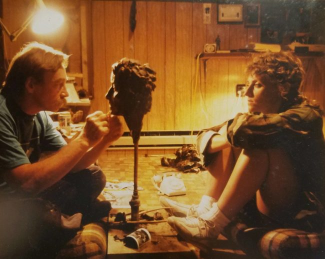 "My dad sculpting a bust of my mom 1980s."