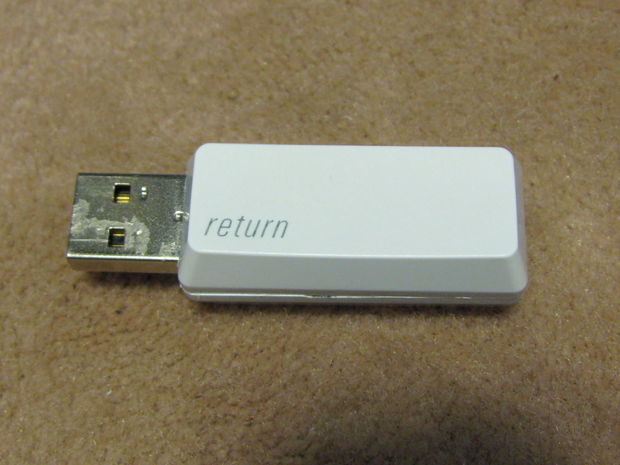 What's more fitting than a USB flash drive case made out of keyboard keys?