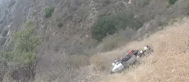 This cyclist was fortunate that he crashed in the bushes on the side of the road, narrowly avoiding a fall into the gorge below.