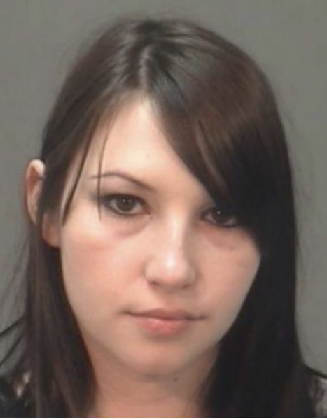 Twenty-eight-year old Amber Schmunk was charged with child endangerment after she let her son ride on top of her minivan to keep a large kiddie pool from flying away.