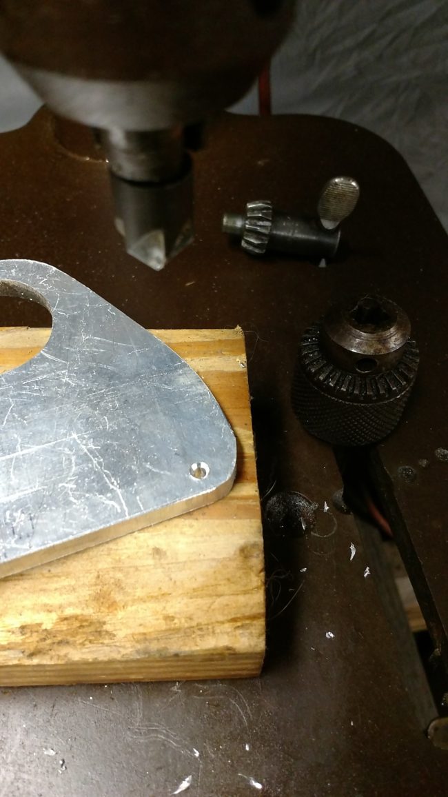 With everything the perfect fit, he went on to cut down the aluminum plate into its desired shape.