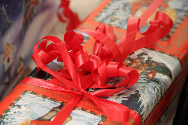 "We threw my daughter a 3rd birthday party for 15 kids and she got a lot of toys, some of which I put upstairs in the attic (because I wanted to bring her out a new toy each week). Now Christmas is coming up and I am wondering, am I being unreasonable to re-wrap some of the toys she opened for her birthday to give them to her for Christmas? Will she remember unwrapping them the first time?" -- Dec13girl