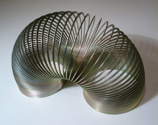 1943: The Slinky, a spring toy invented by Richard James that can do all kinds of tricks, one of the most notable being "walking" itself down a set of stairs.