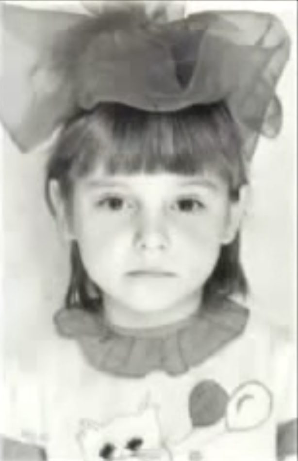Nannette and Vern spent hours rummaging through photographs of kids waiting to be adopted, but one image stood out from all the rest. While most of the children in the photos were smiling, one little girl with a bow in her hair had a somber look that really spoke to the hardships she had endured.