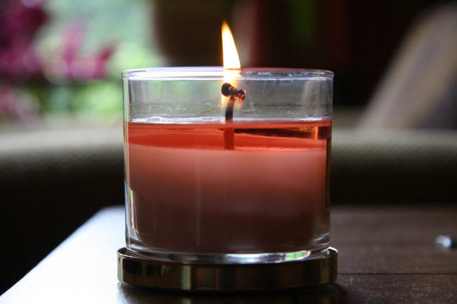 While your favorite candles may smell good to you, their chemical makeup could be making you sick.