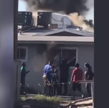 Just as the grandfather got out, a homeless man named Anival Angulo happened to walk by the burning apartment. In the minutes following his arrival, he became a hero.