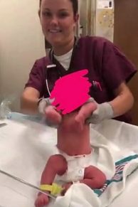 In another, she holds a baby up by the arms and appears to make the infant dance. Joanie Barrett, another corpsman at the hospital, had reportedly taken part in these photos as well.