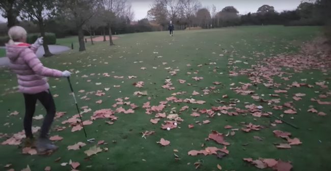 She took her shot, and they all thought they saw the ball hit the flag, so she went running for it.