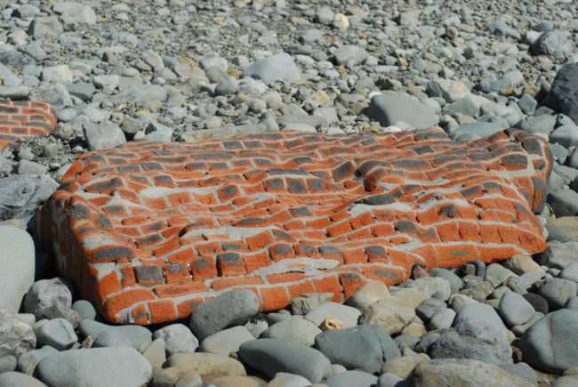 "This whole brick wall which has been shaped by the sea."
