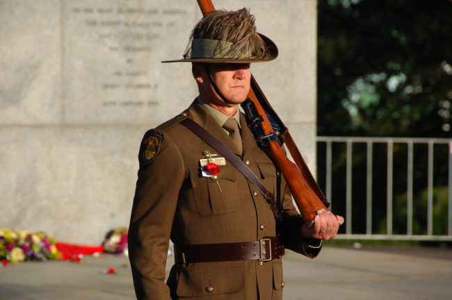 "Stand at a tension" instead of "stand at attention"