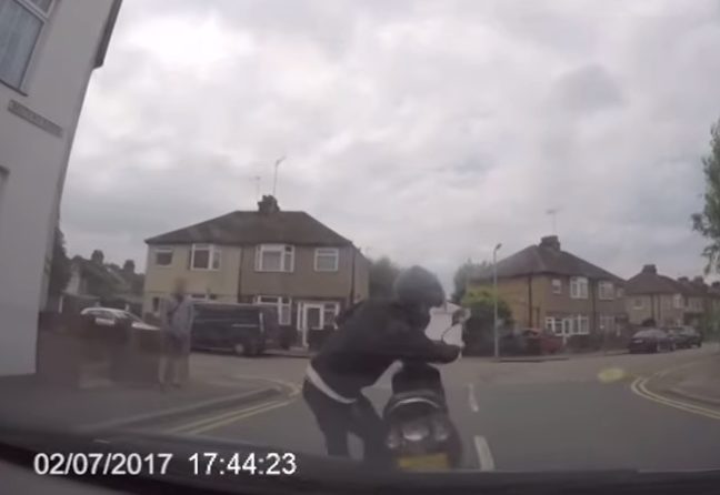 But when she got closer, he didn't mount the scooter; rather, he started running backward with it until it hit the front of her car.