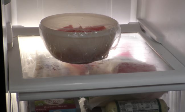 Reusable shower caps can be used to cover and store leftovers.