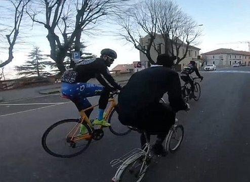 In addition to being dressed for the wrong occasion, he was also riding a casual bicycle that doesn't really stand up to racing speeds.
