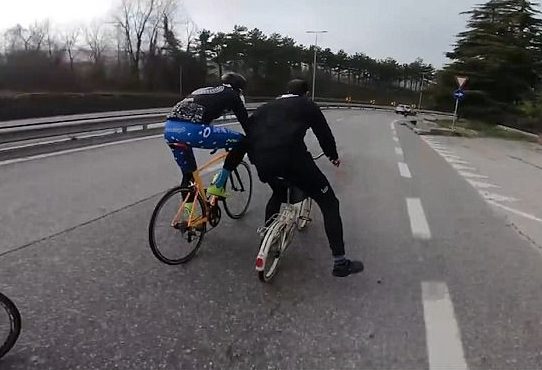 A man fully dressed as a priest (who may or may not actually have been a religious teacher) suddenly came up beside them.