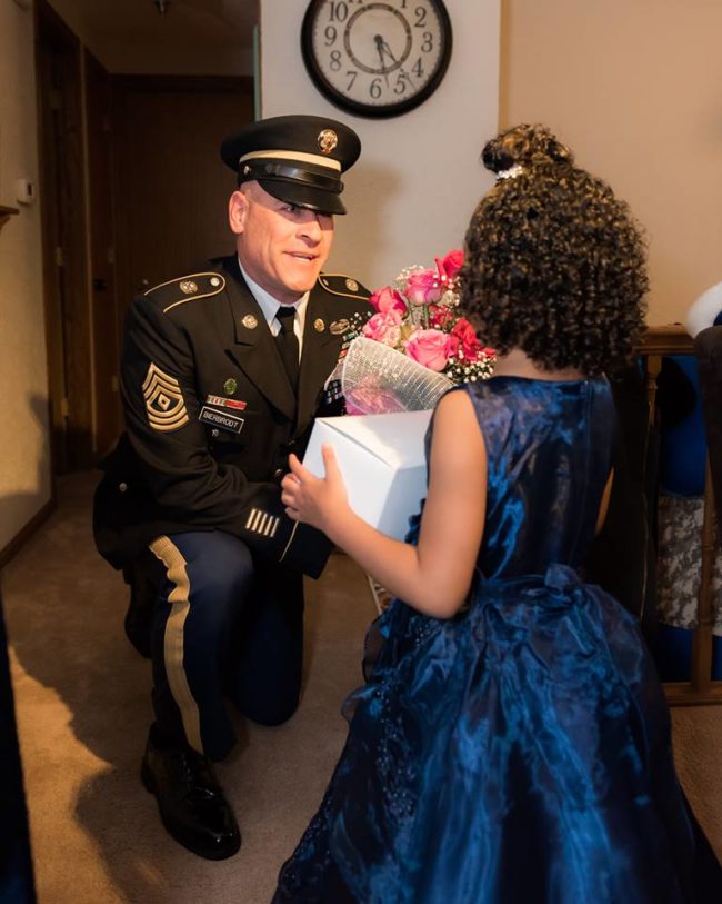 Jillian wanted to make sure the dance would still be special for her little girl, so she reached out to the National Guard and asked whether any soldiers would like to be Cayleigh's escort. First Sergeant Joseph Bierbrodt jumped at the chance, offering Cayleigh pink roses on the big night and asking to be her date. She gladly accepted.