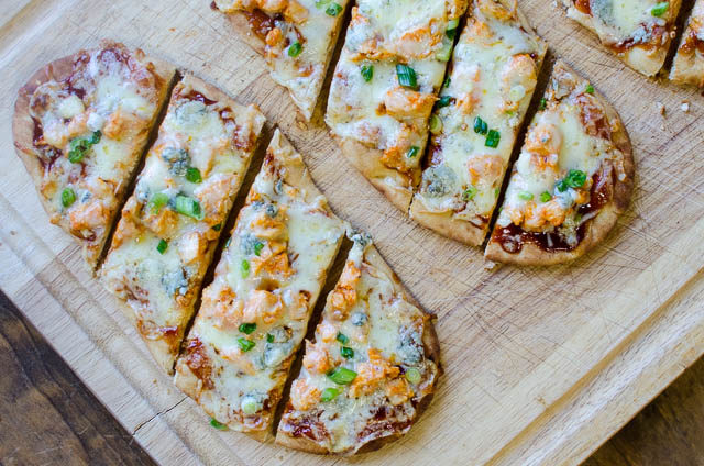 Twenty minutes is all you'll need to put together and bake this buffalo chicken flatbread pizza.