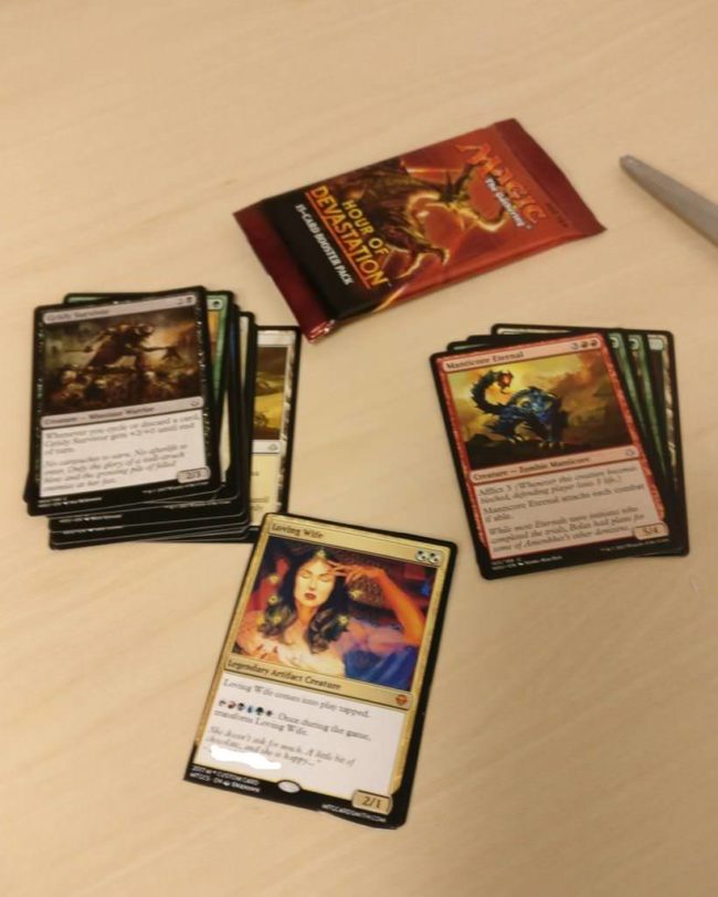 "The plan was simple: The card was placed among the others, making sure to not place it in the front or back so he couldn't feel the difference upon taking out the cards. The prints were simply glued onto the accompanying token in the package."