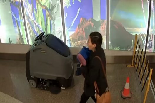 Security footage released by the Tucson Airport Authority last week shows a young woman walking through the airport that day, carrying something wrapped in a blanket.