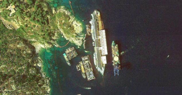 This image is of a very famous shipwreck. The Costa Concordia was wrecked off the coast of Isola del Giglio in Italy back in January of 2002. The Concordia-class cruise ship met its demise after it collided with a submerged rock and capsized later.