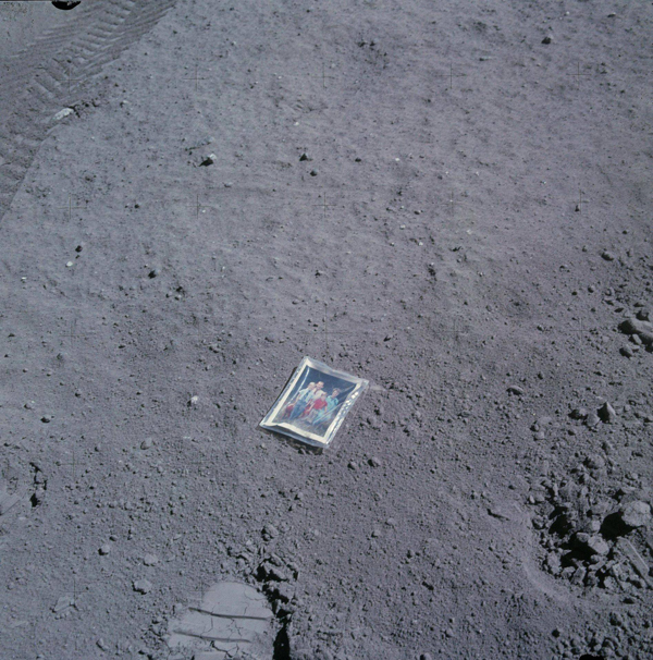 In 1972, as part of the Apollo 16 mission to the moon, astronaut Charles Duke left a photo of himself, his wife, and his two sons which was enclosed in plastic on the moon's surface. He took a picture. That photo remains on the moon’s surface today.