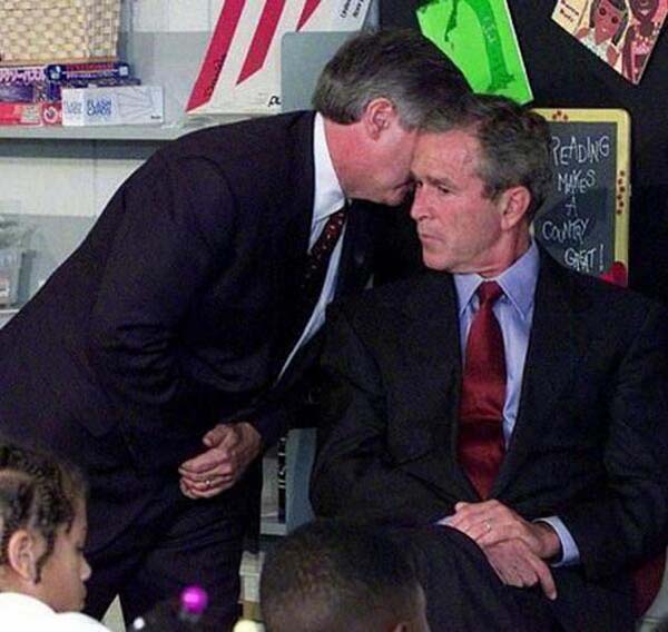 39.) President Bush receiving the news of the terrorist attacks on September 11th (2001).