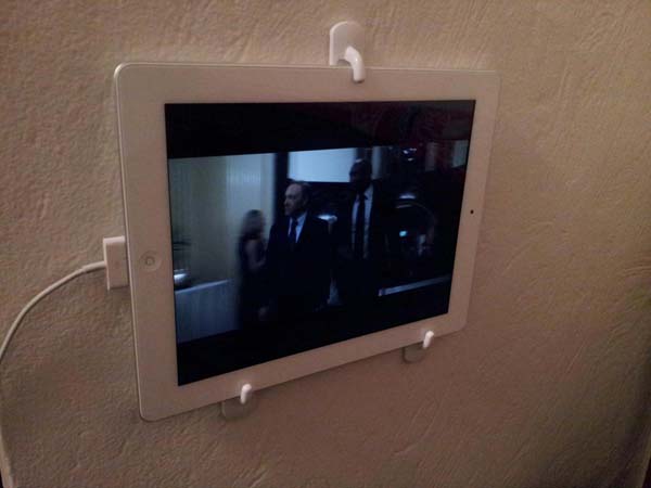 14.) 3M hooks are an awesome way to hang up your iPad and make a tiny TV screen.