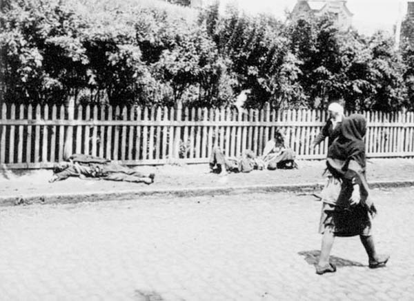 7.) The Holodomor: This Ukranian famine was one of the worst in history. It was a manmade event and recognized as a genocide of millions (comparable to the Holocaust). This is Kharkiv in 1933. Corpses lie in the street, while passers by just go about their day.