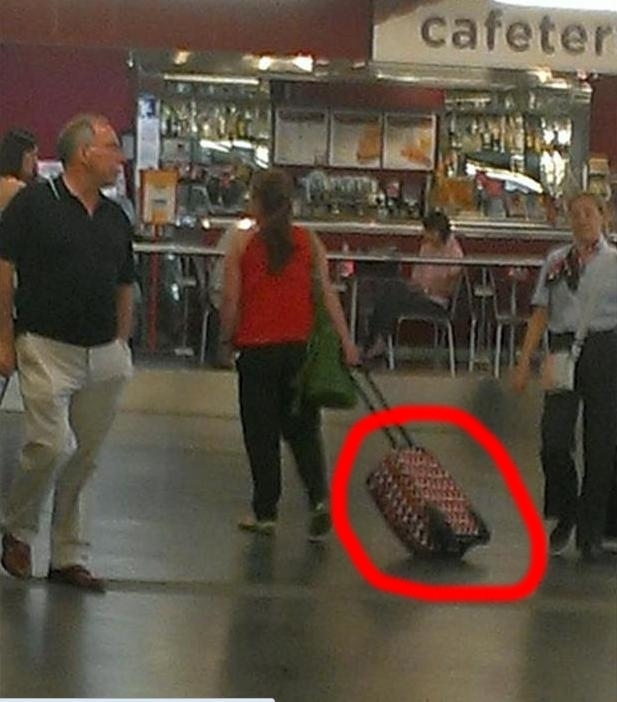 14. Let's just pretend her bag accidentally flipped over while she was using it correctly.